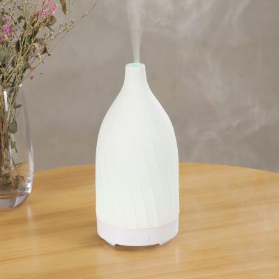 China Ultrasonic Cool Mist Mini Humidifier Air Purifier Household Gift Aromatherapy Oil Diffuser Ceramic Hot Steam Water for sale