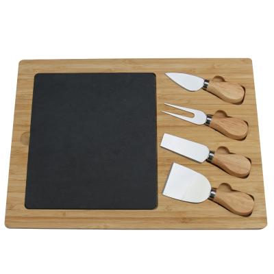 China Viable New Design Wooden Paddle Shape Cheese Cutlery Board Set 4 Piece Acacia Cheese Knife Board Set for sale