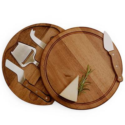 China Sustainable Multifunctional Cheese Knives And Round Acacia Wood Cheese Board With Drawer for sale