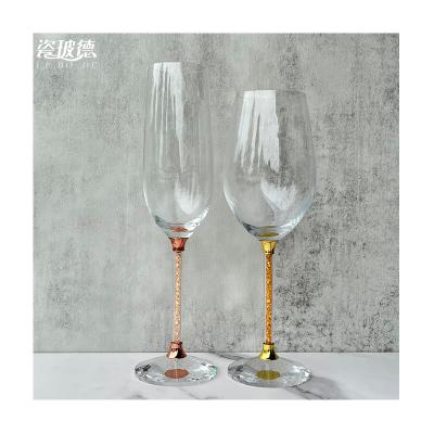 China Stocked Lead Free 230ml Crystal Glass Tumbler With Gold Stem Handmade Customized Couple Set Champagne Glasses Flutes for sale