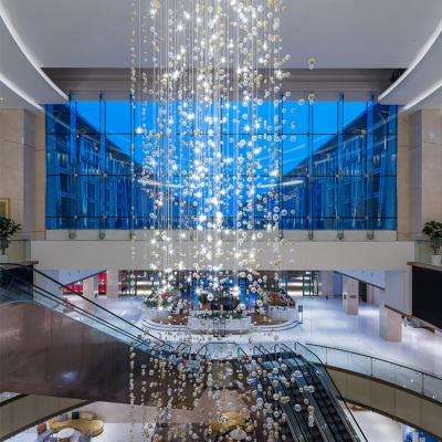 China Modern high-grade custom crystal bead curtain chandelier is suitable for dress shops, hotel and wedding club for sale