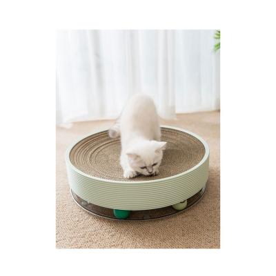 China Sustainable Multifunctional Circular Scratching Board For Cats Two Sides Cushion Cat Scratch Board With Balls for sale