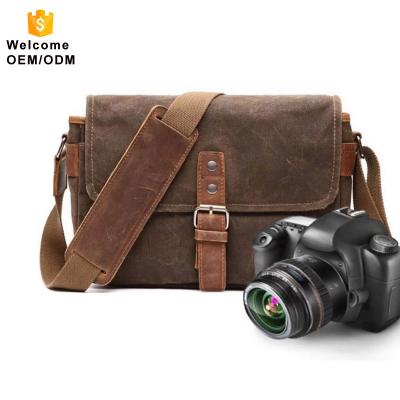 China OEM Canvas Vintage Shoulder Sling Travel Waterproof Canvas Messenger Large Professional Custom Professional Waterproof Camera Bag for sale