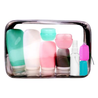 China Portable Full Refill Lotion Silicone Travel Refillable Bottle Set Organized 4-in-1 Makeup Storage Shampoo Silicon Bottle Travel Dispenser for sale