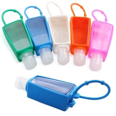 China Personal Care Pocket Travel Size Collapsible Empty 30ml Bottles For Hand Sanitizer Soap Hand Sanitizer Gel Bottles With Silicone Holder for sale