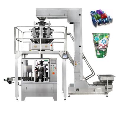 China Easy To Operate System 100g 200g Automatic Weighing Tea Food Packing Zipper Bag Flat Pouch Rotary Packing Machine for sale