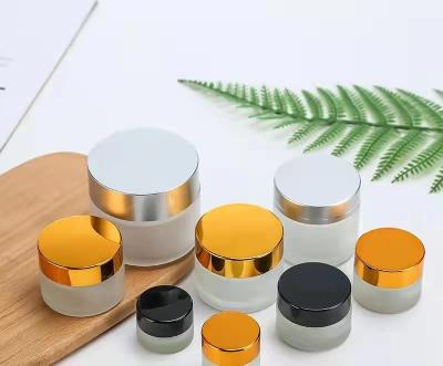 China High Quality And Thick Clear Frosted Skin Care Cosmetic Packaging Empty Cosmetic Cream Glass Jars With Screw Lid for sale