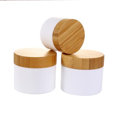 China Eco-friendly Skin Care Cosmetic Packaging 10g Small Packaging Container Frosted Bamboo Wooden Jars Lids Set With Wheat Straw PP Jar for sale