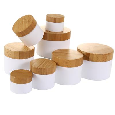 China Skin Care Cosmetic Packaging Factory in Double Wall Stock Cosmetic Jars with Real Natural Bamboo Wooden Lid for Lip Scrub Body Butter Cream Container for sale