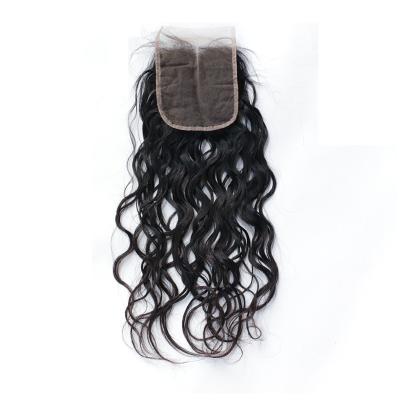 China No Shedding Indian Human Hair 4 by 4 Lace Closure Natural Wave Whole Hand Tied for sale