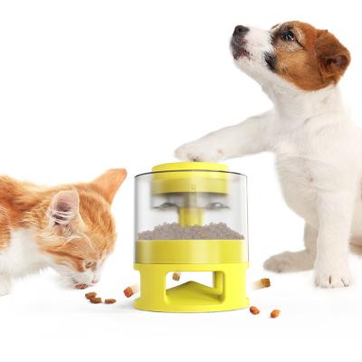 China Automatic Pink Cat Dog Toy Food Feeder Vending Machine With Interactive Performance Push Happy Feeder for sale