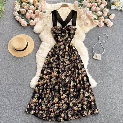 China Anti-Static Design Summer Dress 2022 Vacation Seaside Halter Backless Floral Dress for sale