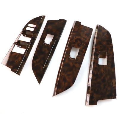 China Luxury Car Interior Decoration LC200 Auto Parts Leopard Print Door Lock Panel Cover Trim For 16-19 Land Cruiser for sale