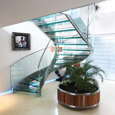 China 2022prefabricated traditional indoor curved staircase with frosted glass stair step and handrail tempered glass stair for sale