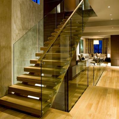 China Modern straight mono stringer steel staircase with hardwood steps and tempered glass balustrade for sale