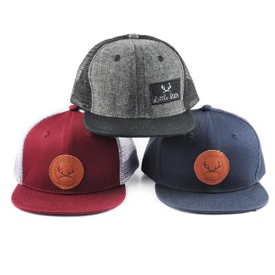 China Lovely COMMON Fashionable Flat Brim Kids Trucker Hats Kids Snapback Mesh Soft Hats for sale