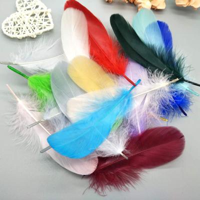 China Goose Feather Custom Colors Dyed Goose Wing Goose Feathers For Crafts for sale