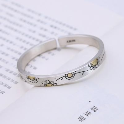 China CLASSIC 999 Pure Silver Sunflower Bangle Yunnan Snowflake Silver Inlaid Vintage Copper Hand-engraved Solid Spike Bangle for sale