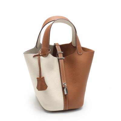 China Other super soft and simple leather female bag 2023 fashionable first layer cowhide basket bucket bag small portable handbag for sale