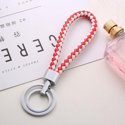 China Leather Cheap Price PU Leather Braided Rope Key Chain Custom Brown Leather Keychains With Logo for sale