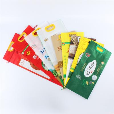 China Recyclable Custom Printing Plastic With Handle Side Gusset Vacuum 5kg 10kg Rice Packaging Bag for sale