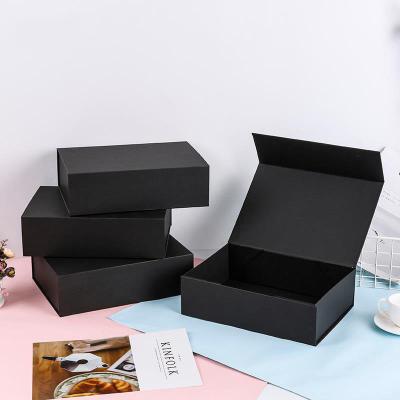 China Custom Recycled Materials Logo Matte Black Folding Magnetic Folding Flip Top Cardboard Gift Boxes Cosmetics Packaging Box for sale