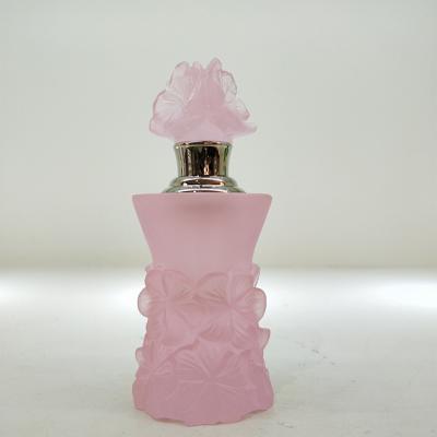 China Arabic Flower Shaped Outlet Custom Style Bottle Glass Perfume Oil Bottles For Gifts for sale