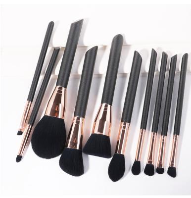 China Soft stiffens hot sale new 10pcs make up brush slant tail handle black wooden makeup brush set for sale