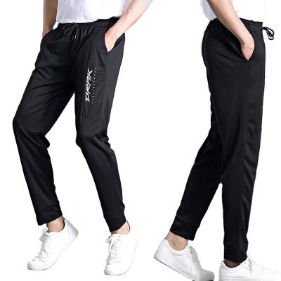 China Anti-Wrinkle Drawstring And Pocket Loose Fitness Sweatpants For Jogging Casual Black And Gray Pants for sale