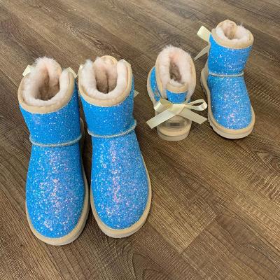 China Popular design cheap wholesale waterproof children round new little girls snow boots sparkle material for sale