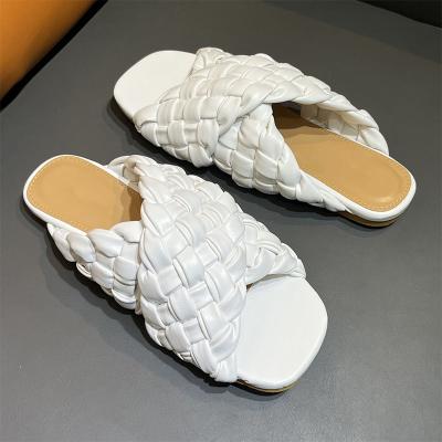 China 2022 fashion trend slippers women's flat sandals braided candy color fashion large size women's shoes for sale