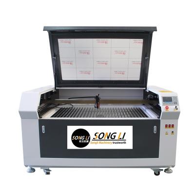 China 6090 mini co2 laser stamp machine water cooled laser engraving machine for mdf leather wood plastic made in china for sale