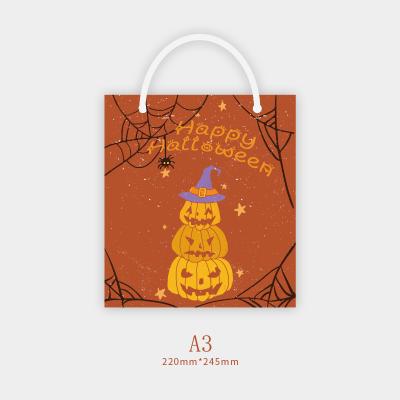 China Recyclable Custom Pattern Halloween Handbag Candy Gift Bag Personalized Kraft Paper Bags for sale