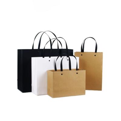 China Wholesale Customized Spot Rivet Paper Bag Recyclable Portable Custom Clothing Store Shopping Bag High Grade Gift Bag for sale