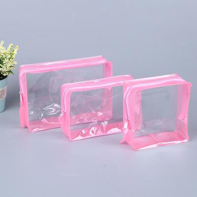 China Meterial eco-friendly printed transparent waterproof half white pouch clear color pvc makeup cosmetic bag travel bag for sale