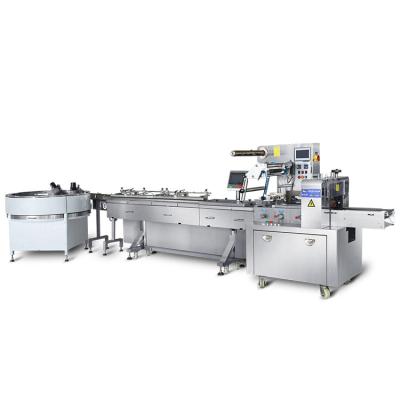 China Food Products Rice Bars Egg Roll Chocolate Stick Feeder Sealer Rotary Wrapping Line Automatic Flow Packing Machine for sale