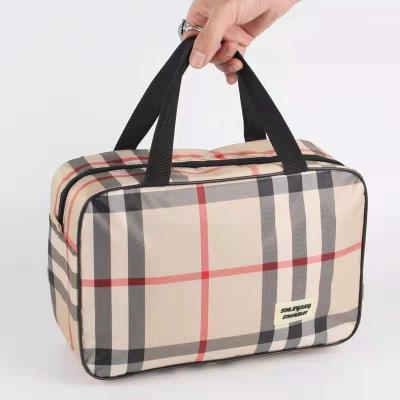 China Retro Style Customized Mesh Multi Stripe Storage Bag Large Capacity Travel Storage Bag Cosmetic Function Wash Bag for sale