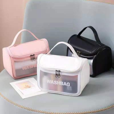 China New Fashion Transparent Waterproof Cosmetic Bag Rope Handle PVC Cosmetic Storage Bag With Cover for sale