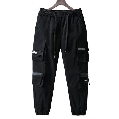 China 2021 Anti-wrinkle men Multi-pocket harem hip pop pants mens cargo pants mens fashion drawstring pants jogger pants for sale