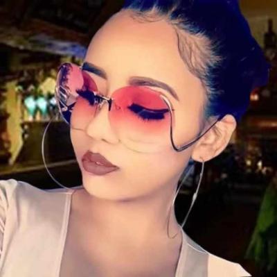 China Fashion Sunglasses Shape Curl Rimless Leg 2021 Brand Designer Newest Colorful Lens Trendy Women Oversized Sun Glass Shades Sunglasses for sale