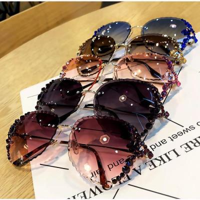 China Other Fashion Personality Crystal Frameless UV Protective Sunglasses With Diamond Inset for sale