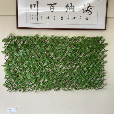 China Eco-friendly Wholesale Artificial Greenery Maple Leaves Screen Plants Fence For Wall Decor for sale