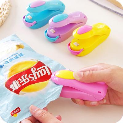 China Viable Bag Mini Portable Food Clip Heat Sealing Machine Hand Pressure Heat Sealer Snacks Gadgets Kitchen Accessories Tools for sale