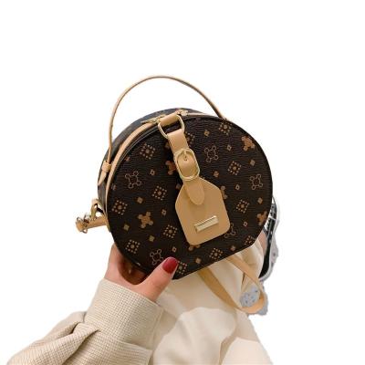 China Lady small round bag Ladies cross-body  retro fashion foreign style portable round cake bag custom purses and handbags bags women for sale