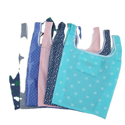 China Reusable Folding shopping bag small square  storage bag Oxford cloth printed household grocery  folding bag for sale