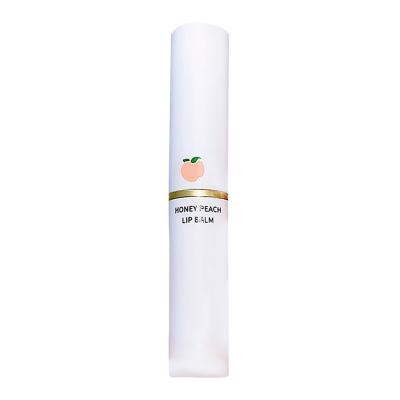 China Moisturize Lip Care Peach Flavor Lip Balm Repair Lipstick Organic Moisturizing Colorless Lipstick for sale