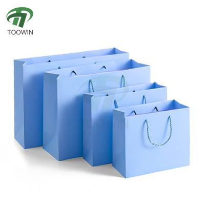 China Custom Shopping Bags With Handle For Business Luxury Art Paper Bag for Clothing Store for sale