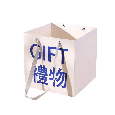 China Toowin Craft Rpet Laminated Shopping Bag Green Flower Paper Bag for Cosmetics Store for sale