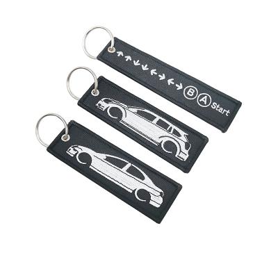 China Original Key Chain Logo Embroidery Patch Car Key Chain Fabric Letters Durable Embroidery Patch for sale