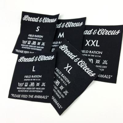 China Manufacturer Directly Black Neck Label Flat High Density Woven Label Custom Brand Label Woven Garment Accessories for sale